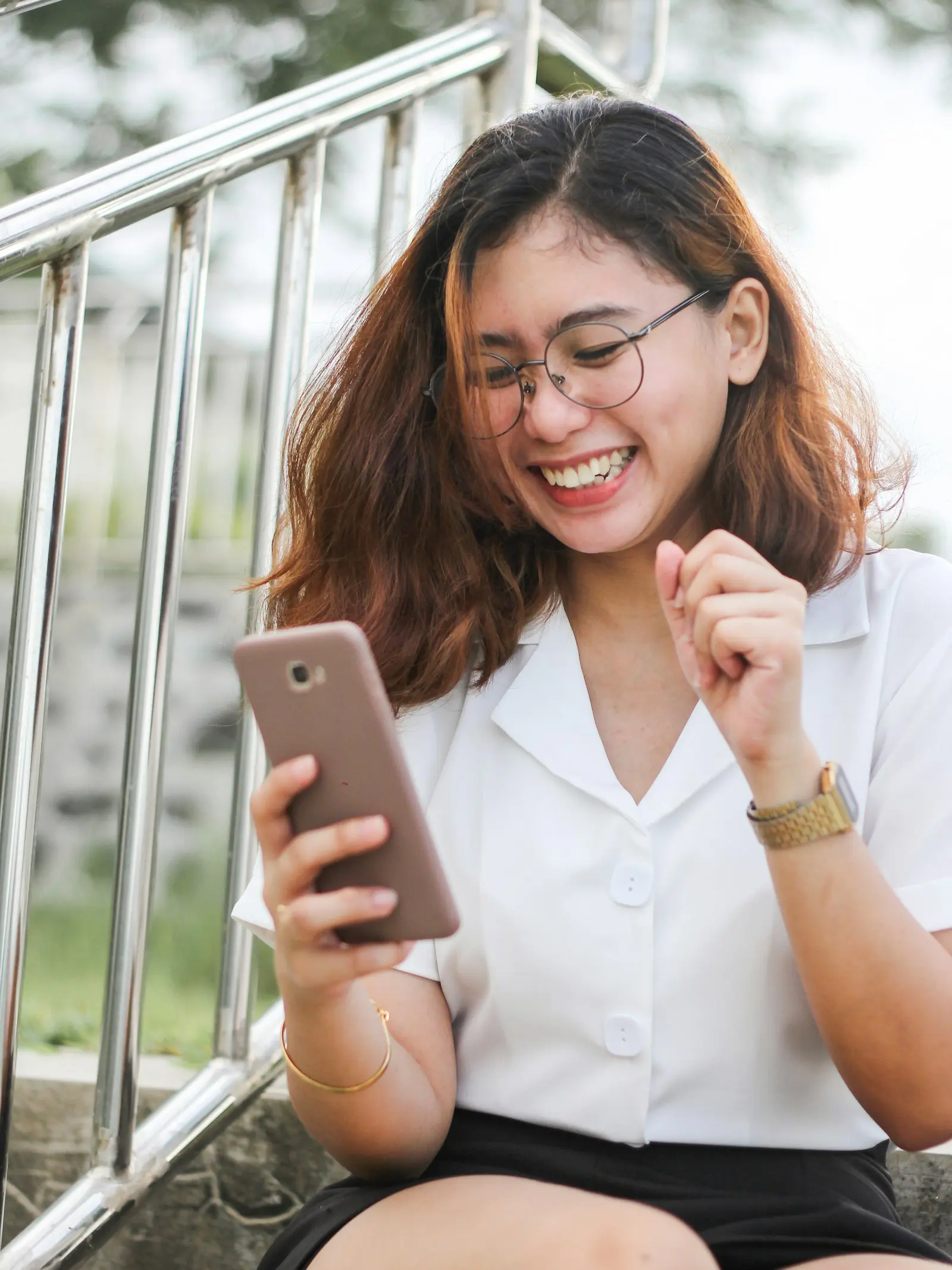 Korean tourist searching for travel information on smartphone before Vietnam trip
